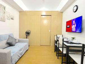 Cozy 1 Bed Unit WIFI in Grace Residences Taguig City