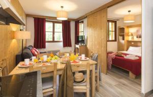 Appartements travelski home select - Residence L'Oree des Pistes 3 stars : photos des chambres