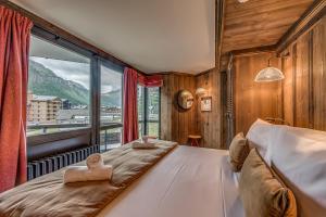 Appart'hotels HOTEL LE VAL D'ISERE : photos des chambres