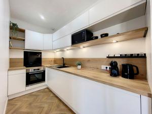AppartChic - appartement standing - plein Centre & Parking privé