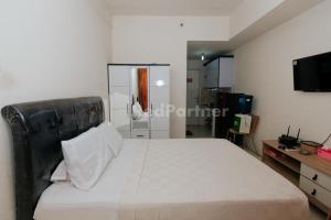 RedLiving Apartemen Skylounge Tamansari - Vanez Room