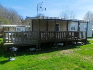 Maisons de vacances Bungalow de 3 chambres avec piscine partagee et jardin amenage a Litteau : photos des chambres