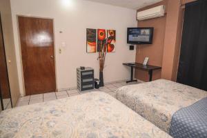 Departamento D centrico 2 camas Tv Ac wifi cocina parking