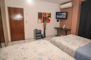 Departamento D centrico 2 camas Tv Ac wifi cocina parking - Huichimal