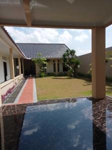 EXPRESS O 91708 Rumah Sriwijaya 12a Syariah