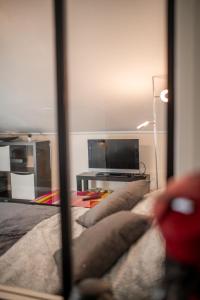 Appartements KASA CARNOT - Centre ville - Wifi & TV : photos des chambres