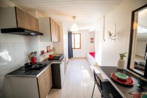 Appartements KASA CARNOT - Centre ville - Wifi & TV : photos des chambres