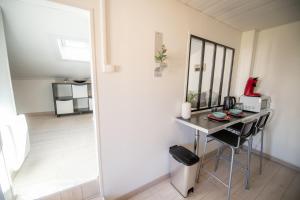 Appartements KASA CARNOT - Centre ville - Wifi & TV : photos des chambres