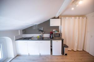 Appartements KASA CARNOT - Centre ville - Wifi & TV : photos des chambres