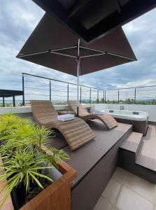 J Spazio Apartelle and Cafe