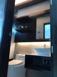 J Spazio Apartelle and Cafe