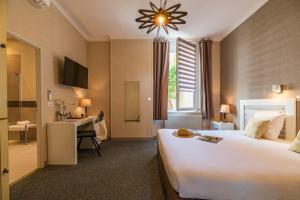 Hotels CERISE Royan - Le Grand Hotel de la Plage : photos des chambres