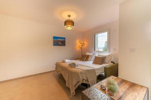 Appartements Aux balcons anneciens- Entre Lac et centre ville, LLA Selections by Location lac Annecy : photos des chambres