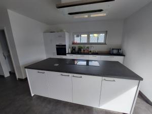 Nice Room with single bed in a new house in Vichten