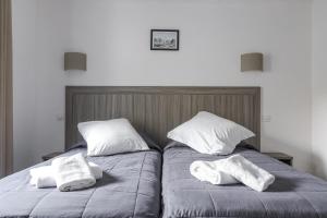 Hotels Hotel Les Palmiers En Camargue : photos des chambres