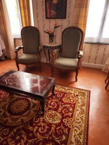 B&B / Chambres d'hotes Les Volets Bleus : photos des chambres