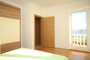 Seaside apartments with a swimming pool Ugljan - 829