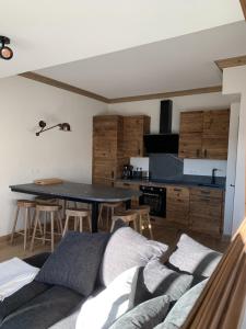 Appartements Les 7 laux immobilier chalet F : photos des chambres