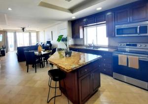 Stunning oceanfront condo on usable Sandy Beach
