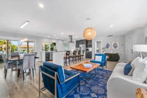 Seven Palms Waterfront- Private Dock, Heated Pool & Lanai -Walk to beach! by Maven Vacation Rentals