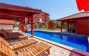 Nice Apartment In Banjol With 2 Bedrooms, Wifi And Outdoor Swimming Pool