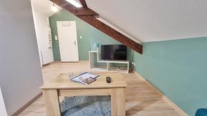 Appartements 2 Charmants logements * CHARMANT GITE COLMAR * : photos des chambres