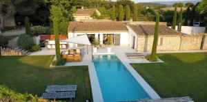 Maisons de vacances Les Cerisiers chez Bert climatise, Piscine chauffee, lit King size : photos des chambres