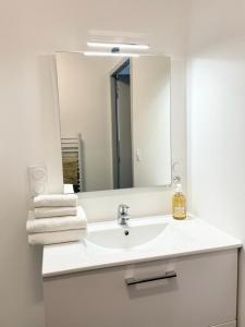 Appartements LE CHIC - Terrasse & Parking : photos des chambres