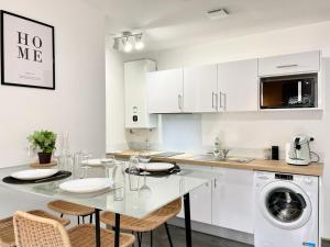 Appartements Le Tropical : photos des chambres