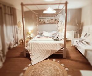 Sejours chez l'habitant Gite Familiale & SPA Prive - LE LOGIS DE PEARL : photos des chambres