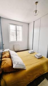 Appartements Balcon du Champ de Mars - Wifi / Parking : photos des chambres