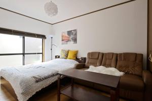 Guest House TIHARU 6bedrooms12people max and Straight to USJ and Near the hot spring