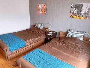 Guest House TIHARU 6bedrooms12people max and Straight to USJ and Near the hot spring