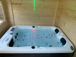 Appartements Jacuzzi et Jardin privatif Maison Detente : photos des chambres