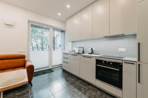 Bangų namai - PALANGA apartamentai su 2-iem terasomis