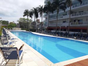 GUARUJÁ ASTURIAS, LAZER COMPLETO, AR CONDICIONADO E VARANDA GOURMET