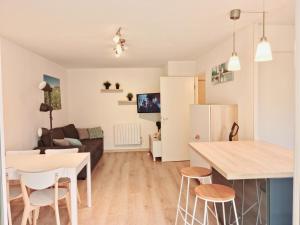 Appartements Appartement avec piscine - Beaune like Home : photos des chambres