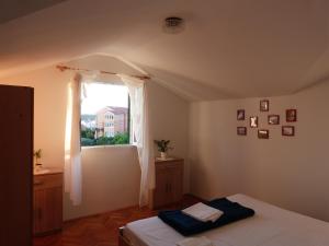 Apartments with parking space Palit, Rab - 14996