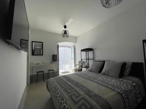 Appartement dans maison de village vue mer