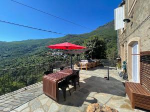 Appartement dans maison de village vue mer