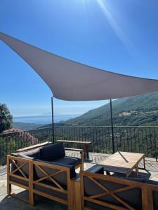 Appartement dans maison de village vue mer