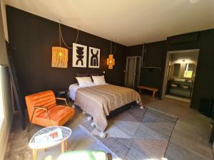 Appart'hotels La Maison de Lyna - Suites de charme intra-muros avec parking & autonomie : photos des chambres