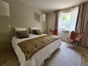 Appart'hotels La Maison de Lyna - Suites de charme intra-muros avec parking & autonomie : photos des chambres