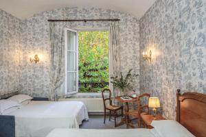 Hotels Hotel des Grandes Ecoles : photos des chambres