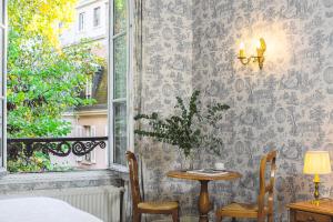 Hotels Hotel des Grandes Ecoles : photos des chambres