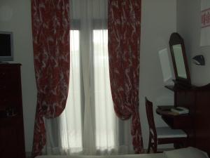Doppel- oder Zweibettzimmer