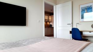Komfortable strandnahe Ferienwohnung mit Terrasse und Meerblick in 10ter Etage
