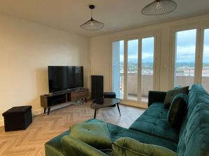 Appartements Appartement cosy avec vue imprenable sur la cite : photos des chambres