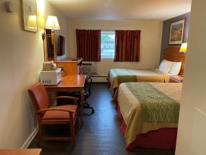 Queen Room with Two Queen Beds room in Village Inn Green Bay