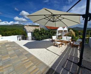 House Camellia with fenced pool and playground